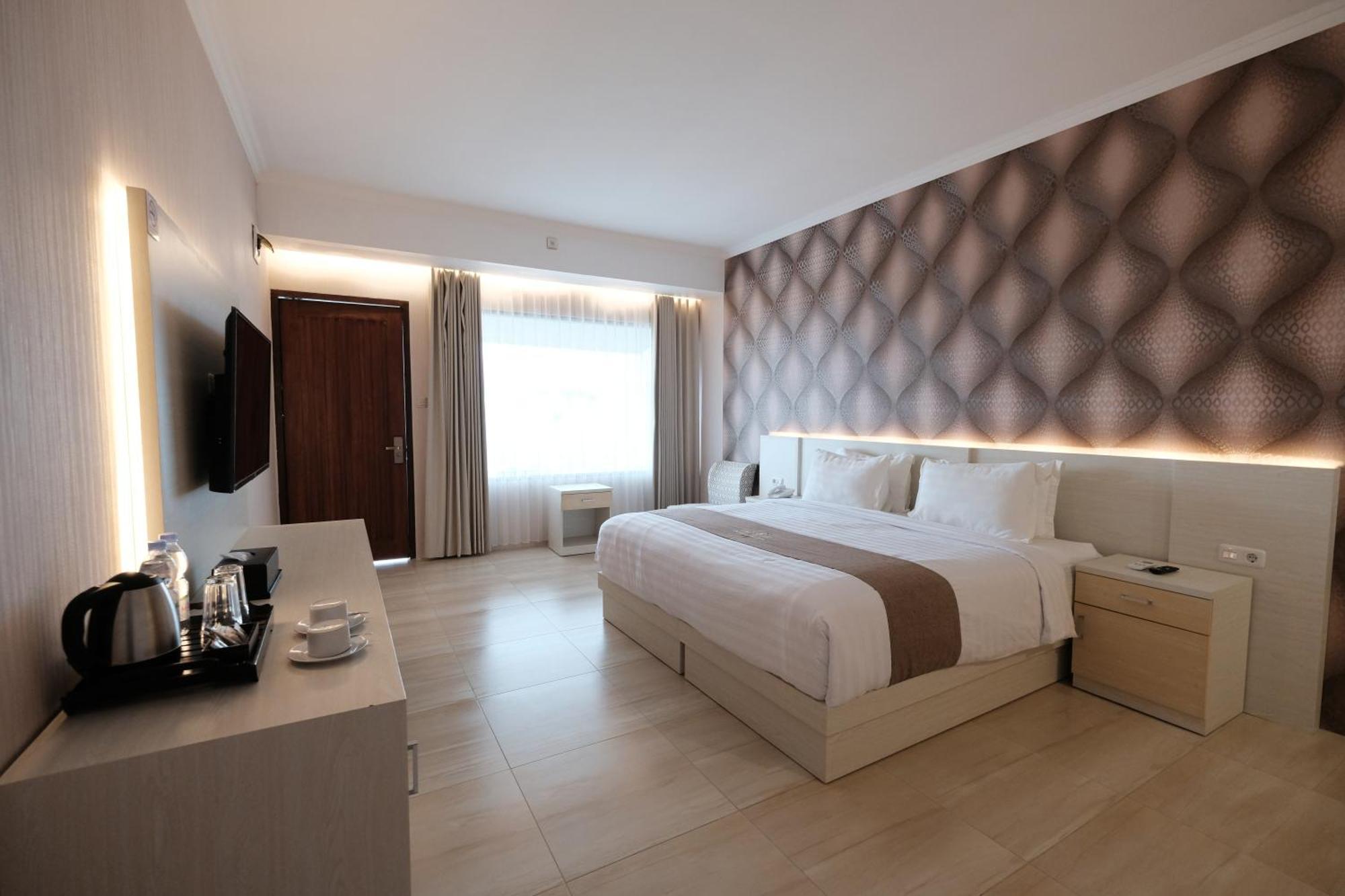 Bukit Indah Doda Hotel & Resorts Палу Номер фото
